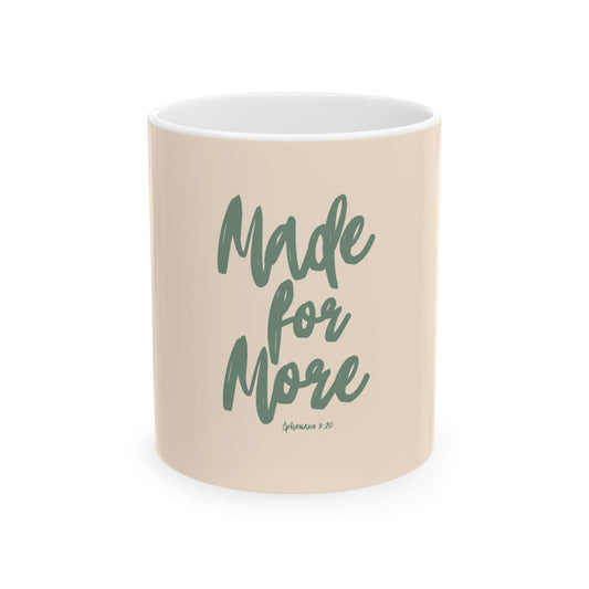 Beige mug with 'Made for More' text on a white background