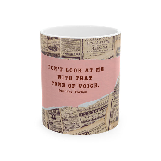 Mug with newspaper design and quote by Dorothy Parker on a pink background