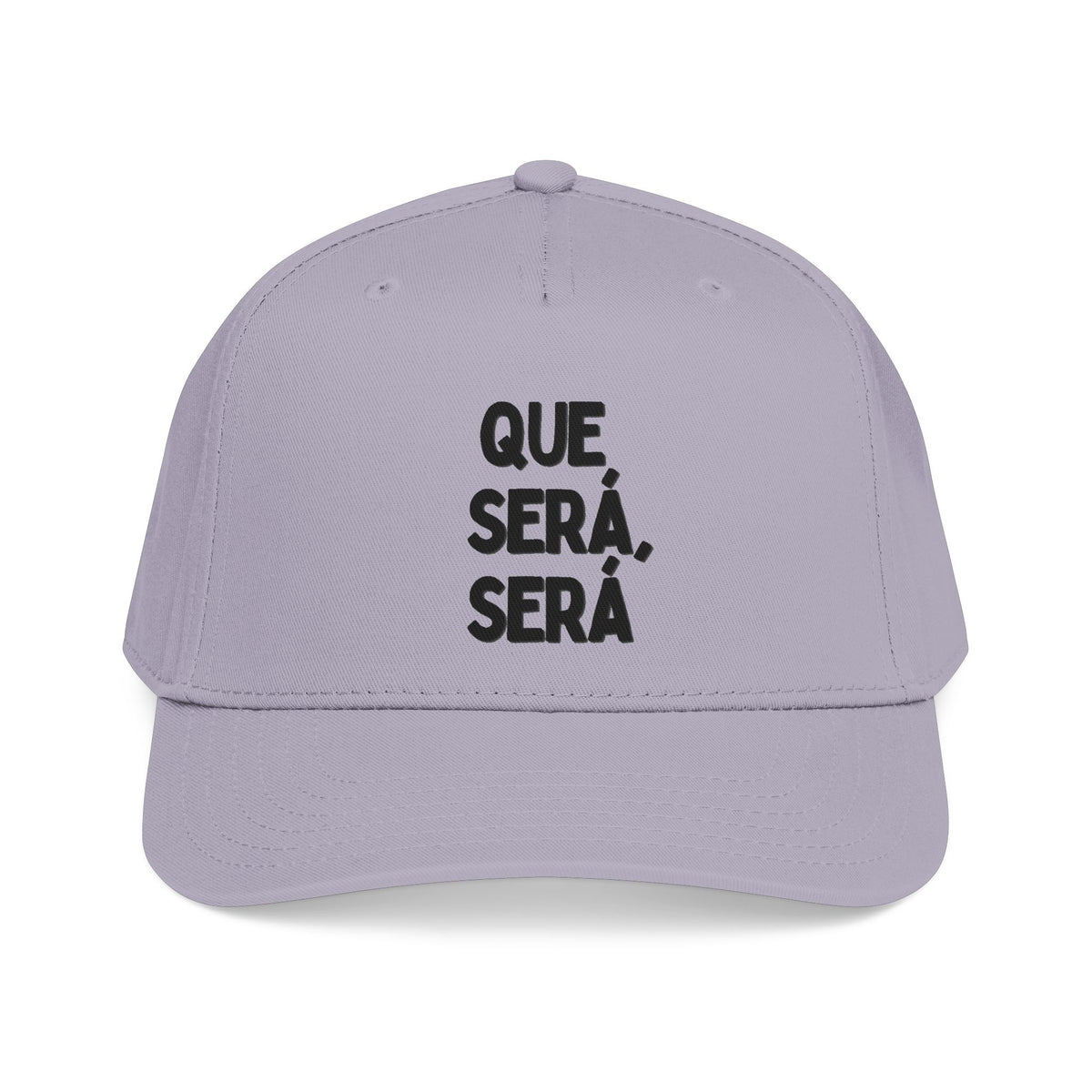 A light purple baseball cap with black text on the front reading 'QUE SERÁ, SERÁ' in Spanish, shown against a plain white background.