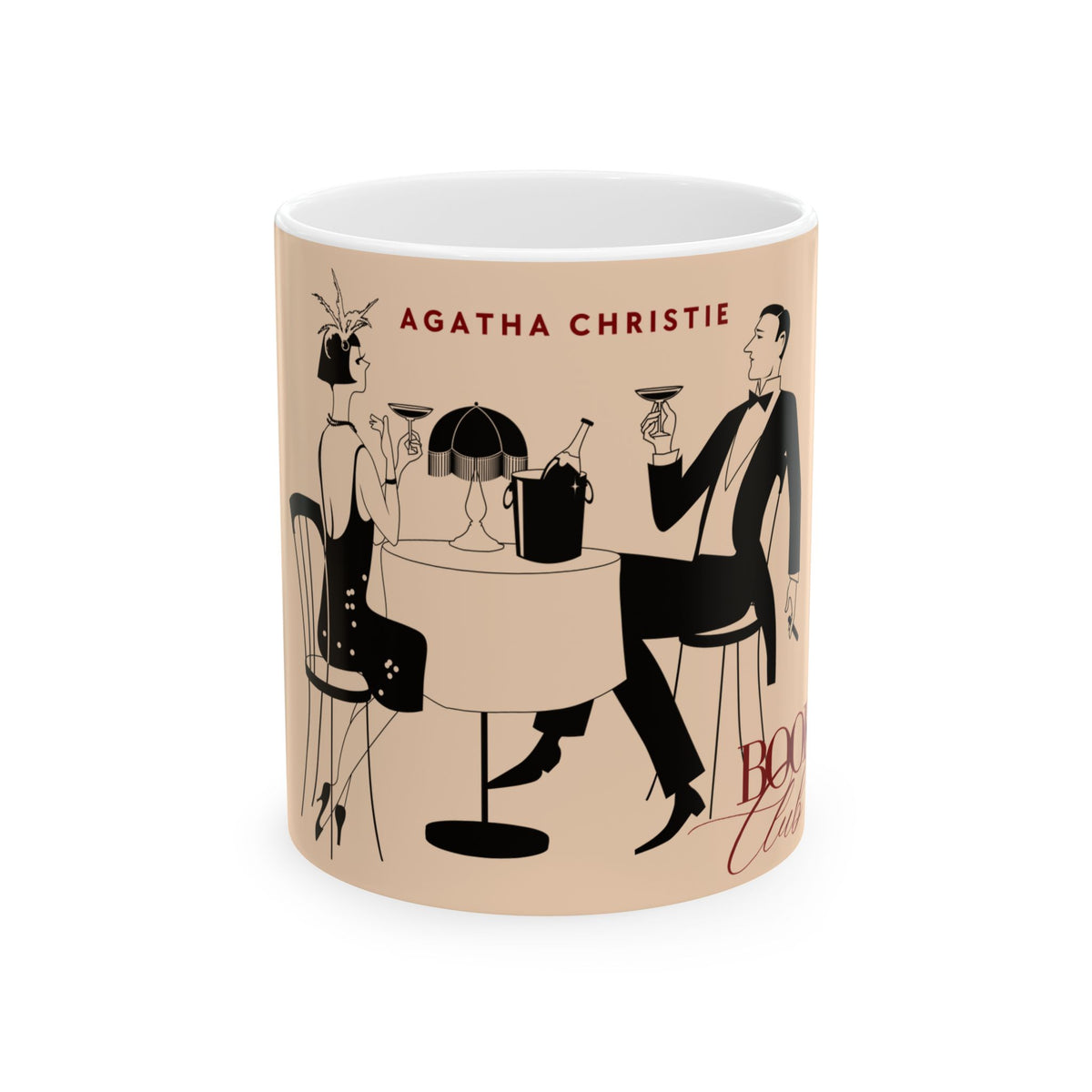 A white ceramic mug featuring an illustration from Agatha Christie's 'The Big Bang Theory' with black and red graphics on a beige background.