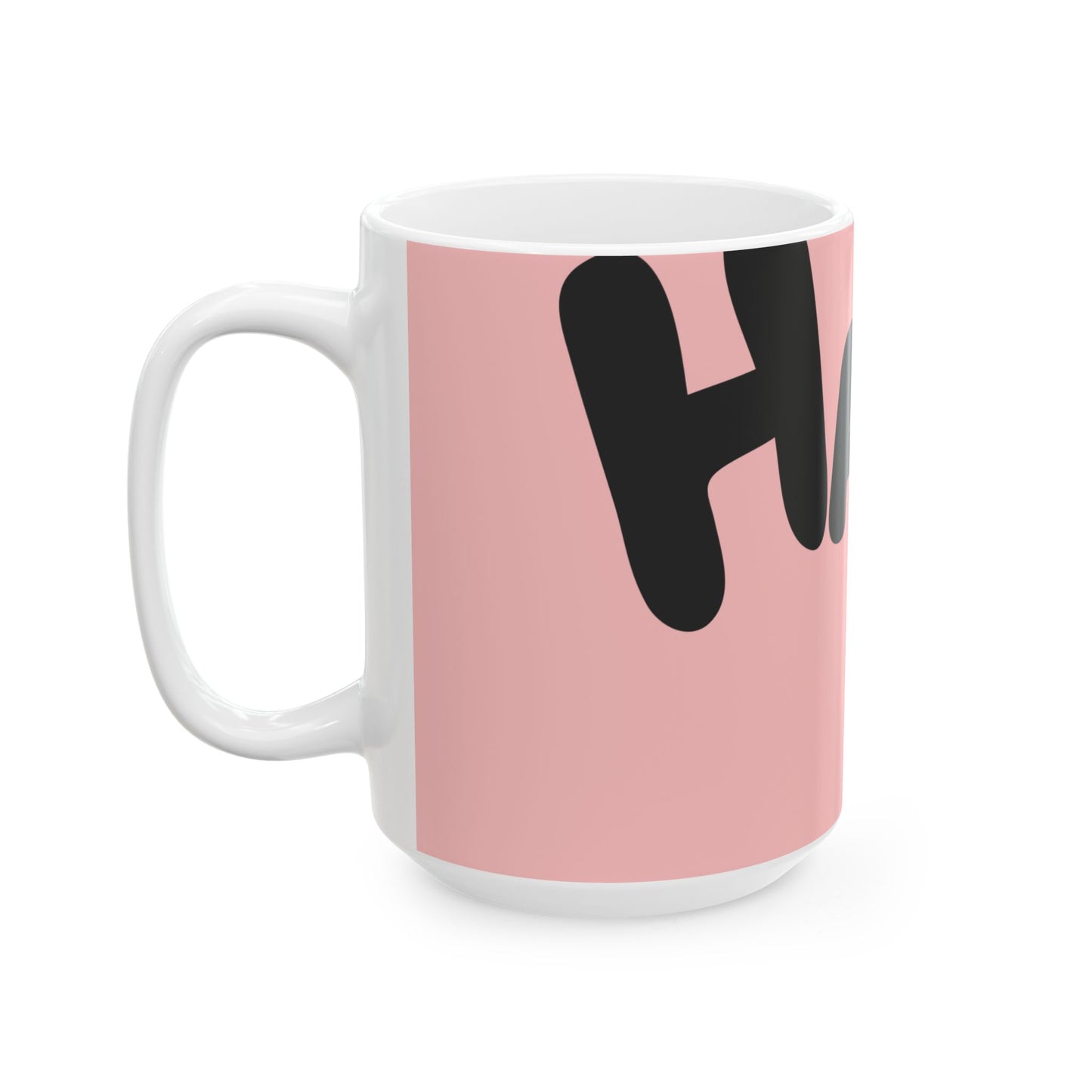 White mug with pink back half and black text on a white background