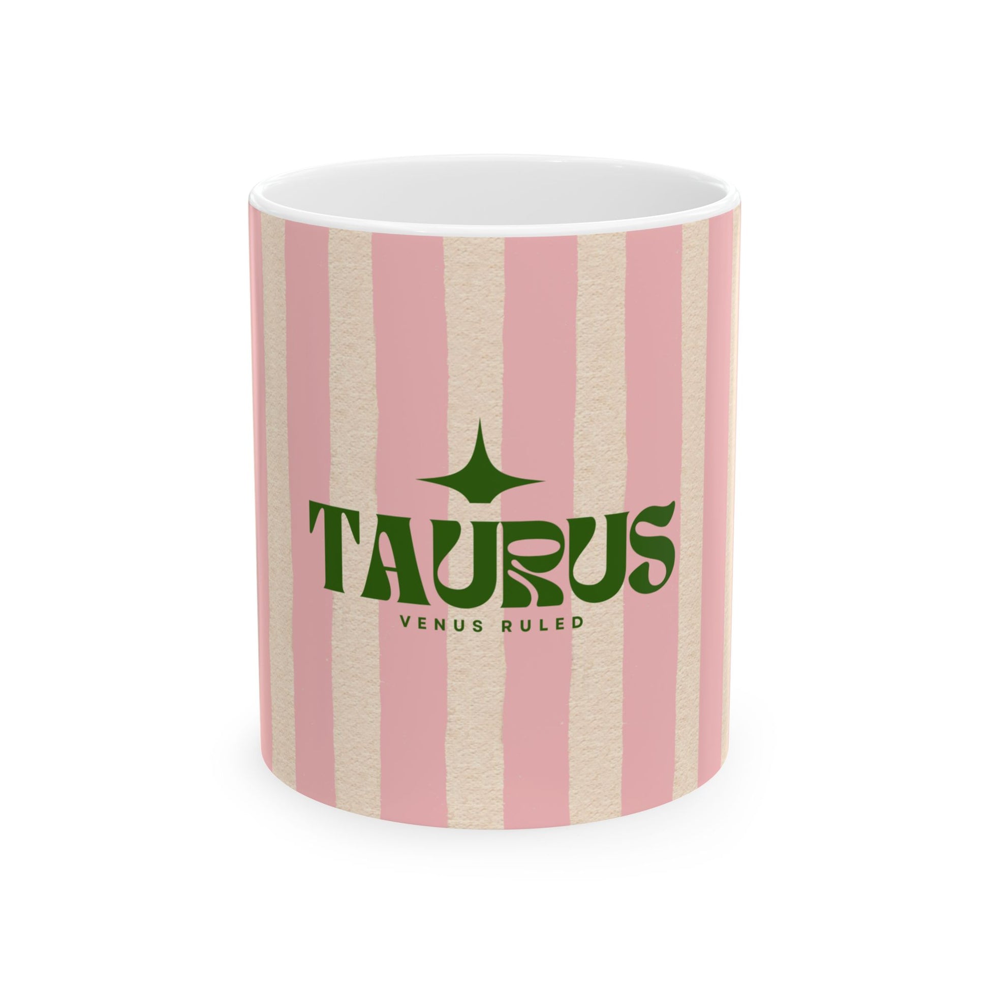 Mug with pink and beige striped pattern and 'Taurus' text on a white background