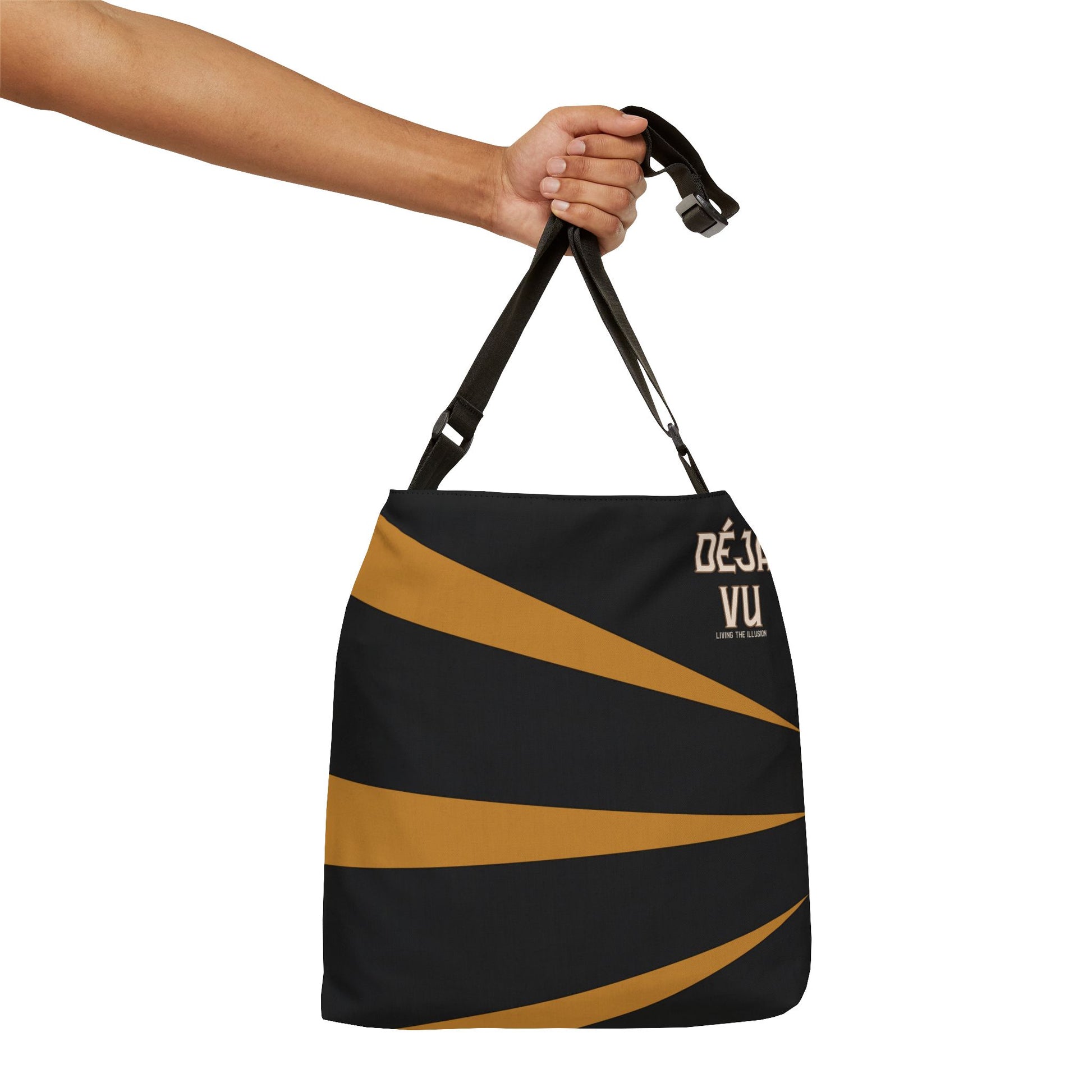 Black and gold bag with 'Deja Vu' branding held by a hand on a white background