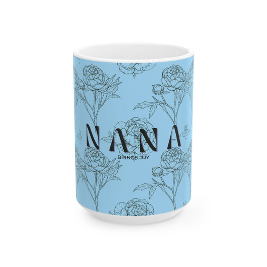 Mug with floral design and 'Nana brings joy' text on a light blue background