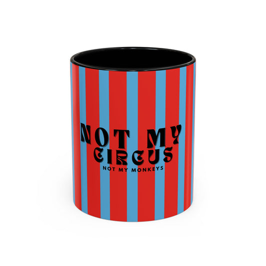 Mug with red and blue striped pattern and 'Not my circus, not my monkeys' text on a white background