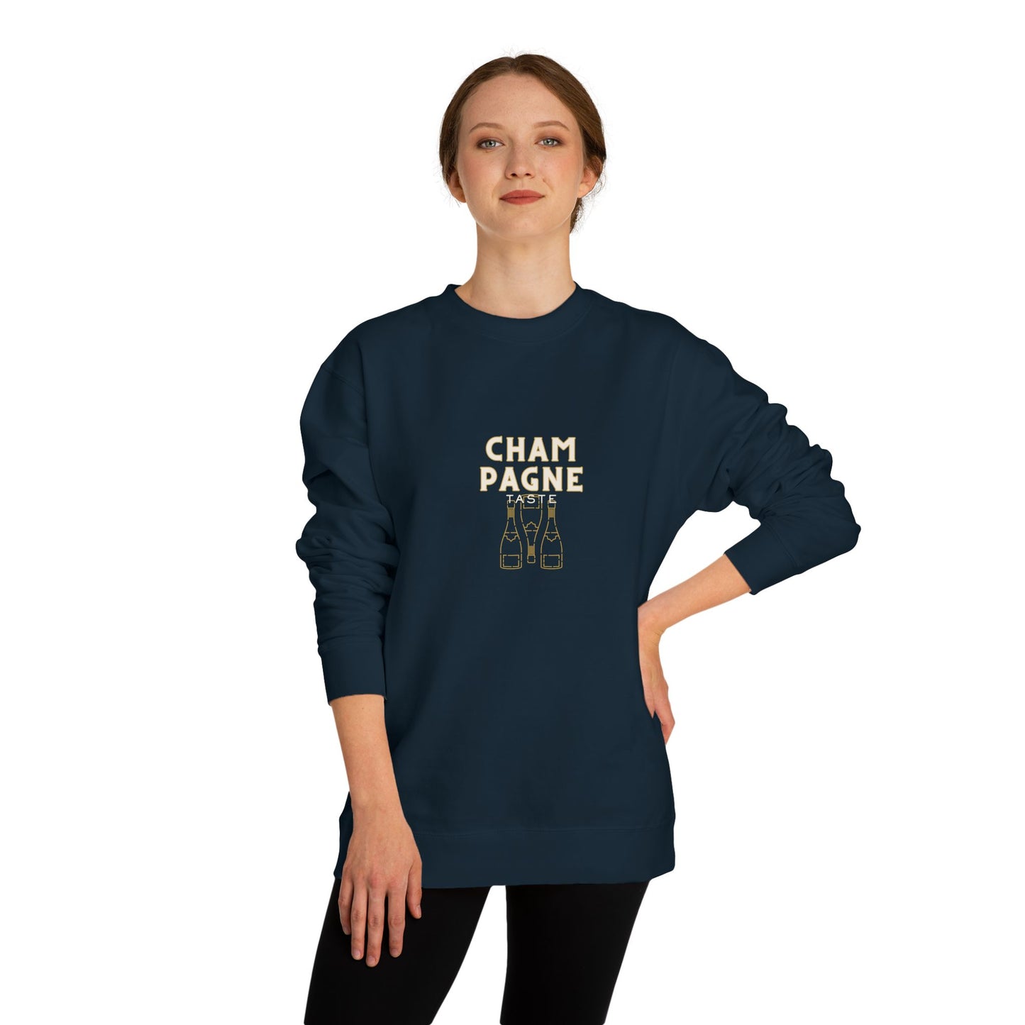 Person wearing a navy blue sweatshirt with text and bottle graphics on a white background