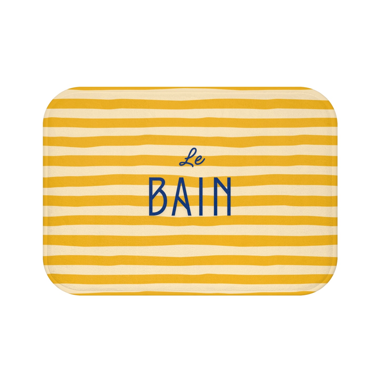 Yellow and white striped bath mat with 'Le Bain' text on a white background