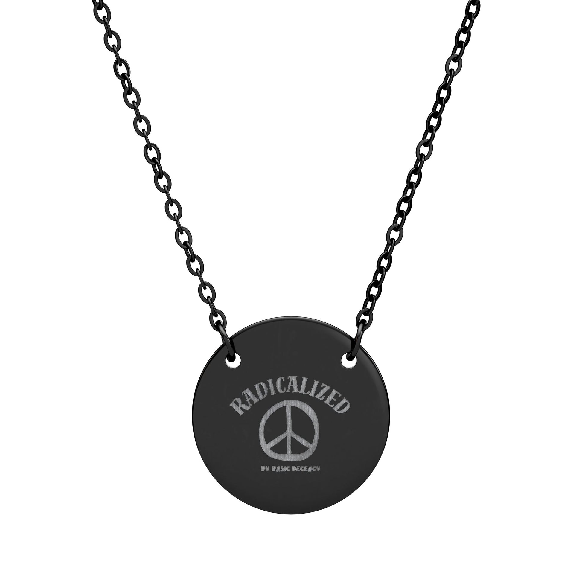 Black necklace with a round pendant featuring a peace symbol and text on a white background