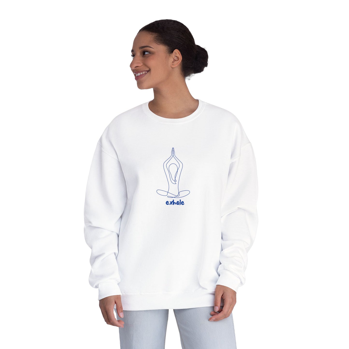 Woman wearing a white sweatshirt with a yoga pose design on a white background