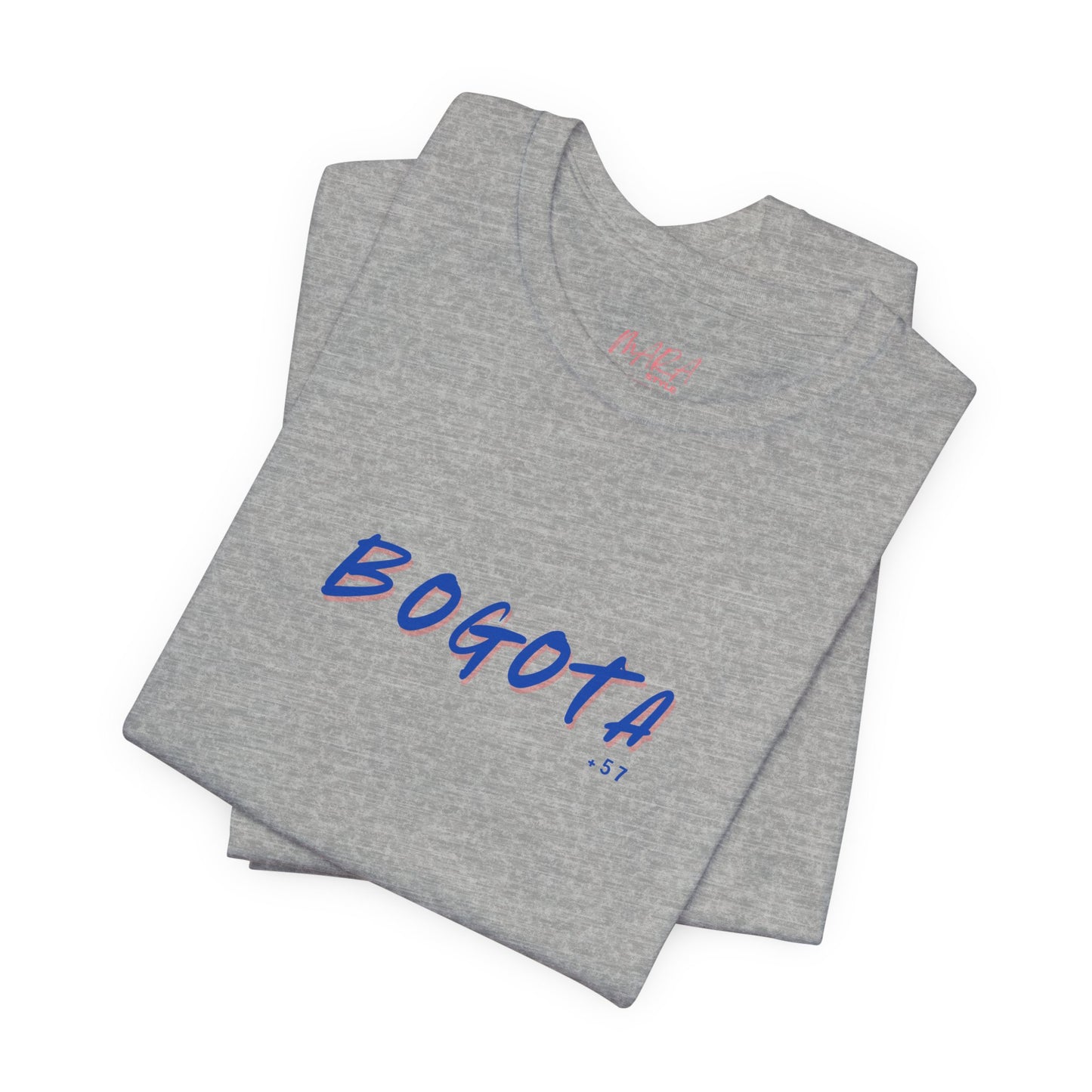 Folded gray t-shirt with 'BOGOTA' printed on it against a white background