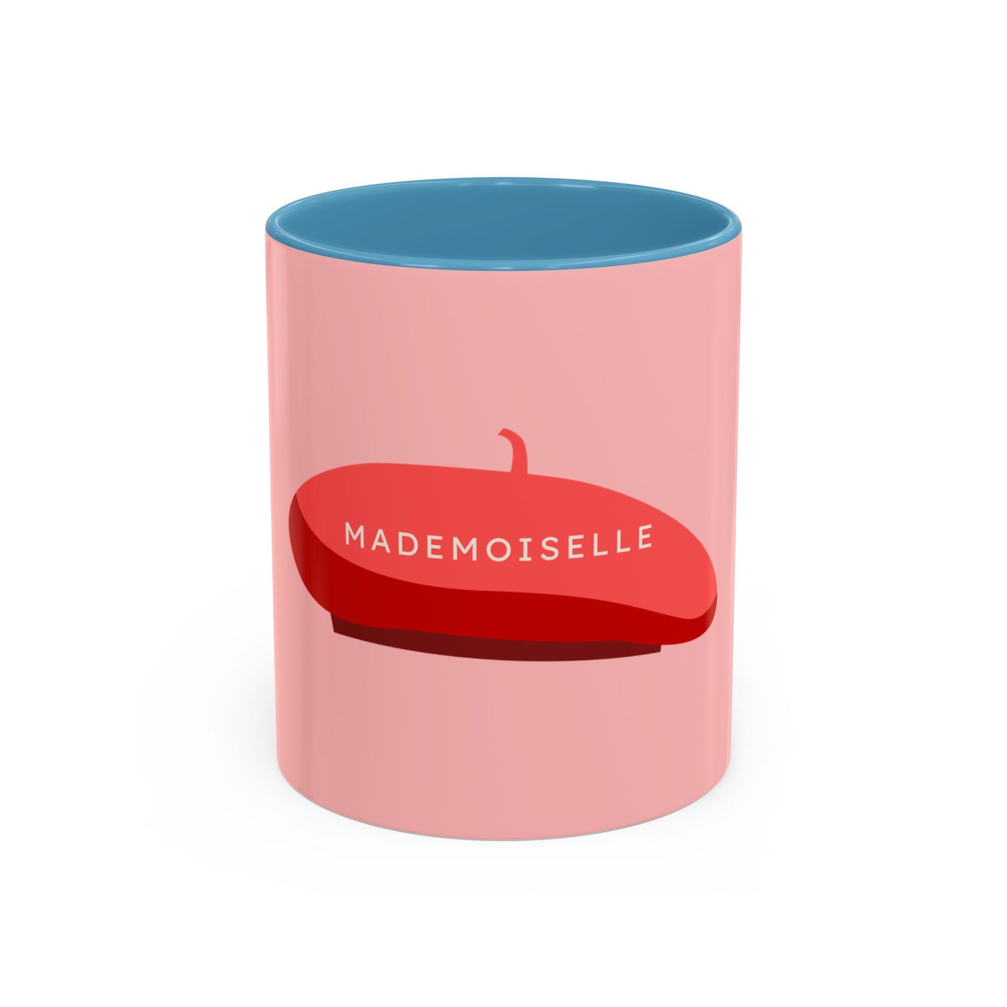 Pink mug with blue interior, red beret design, and 'MADEMOISELLE' text on a white background