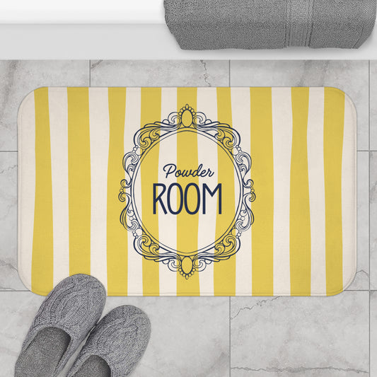 Striped doormat with 'Powder Room' text on a tiled floor.