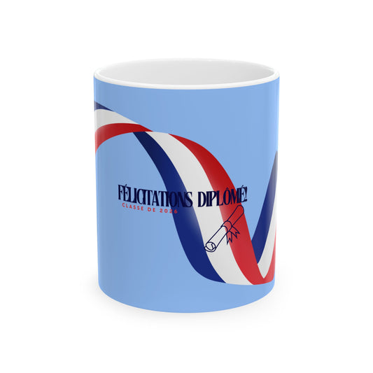 Mug with French text 'Félicitations Diplômè' and tricolor design on a light blue background