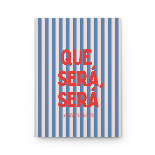 Que Sera Sera Hard Cover Journal with blue and white striped pattern and red text on a white background
