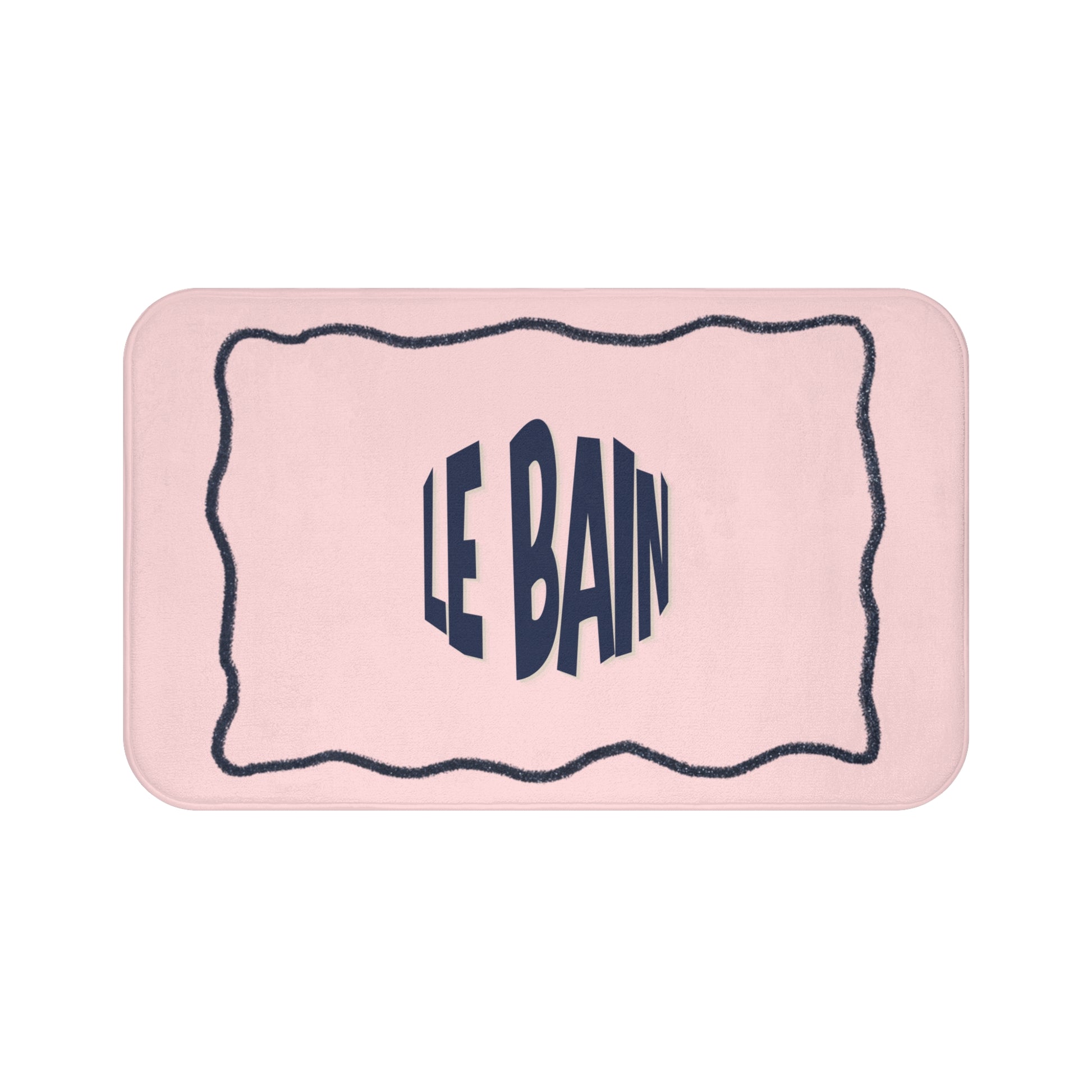 Pink bath mat with 'LE BAIN' text on a white background