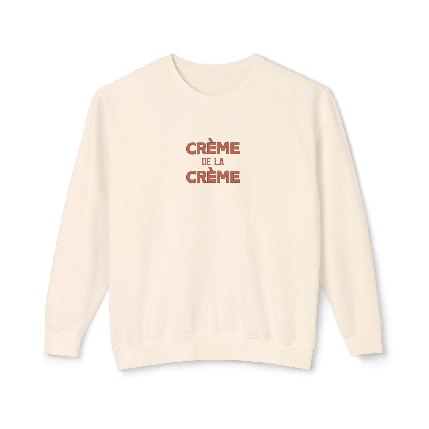 Beige sweatshirt with 'Crème de la Crème' text on a white background