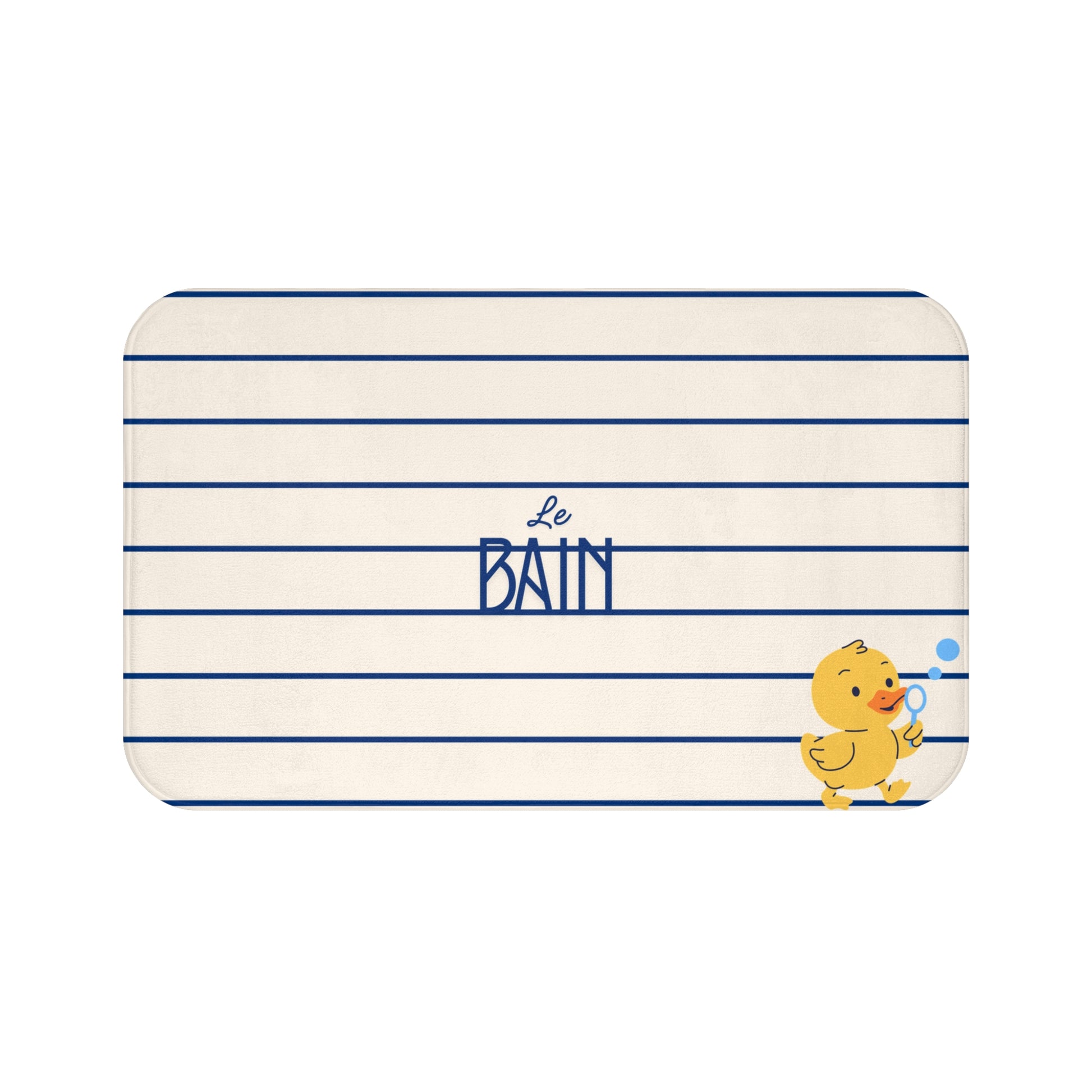 A rectangular bath mat with rounded corners, featuring a cream background with horizontal navy blue stripes, the French word 'Le BAIN' in navy in the center, and a small yellow cartoon duck with blue bubbles in the bottom right corner.
