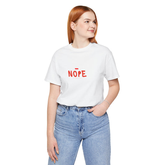 Person wearing a white t-shirt with 'NOPE' in red text on a white background