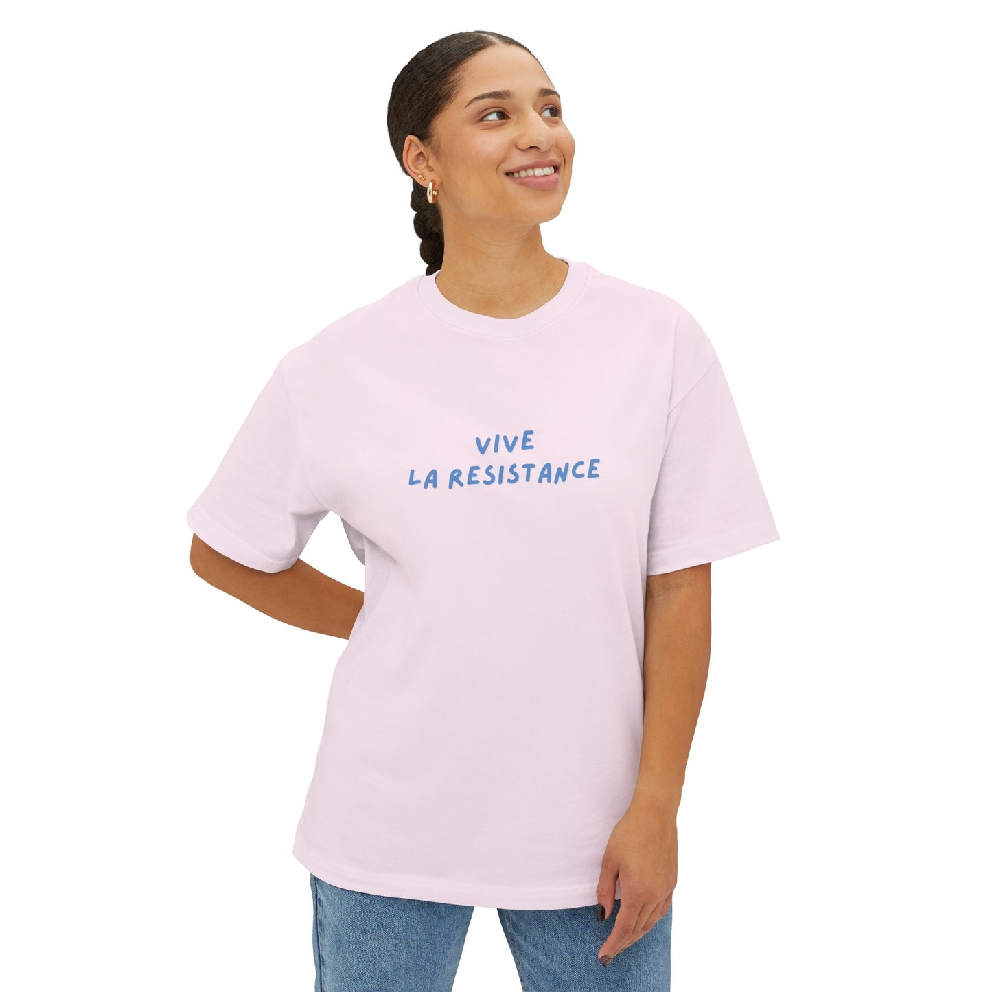 Person wearing a pink t-shirt with 'Vive La Resistance' text on a white background