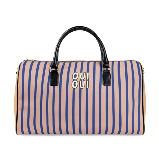 Striped duffel bag with black handle and 'OUI' logo on a white background