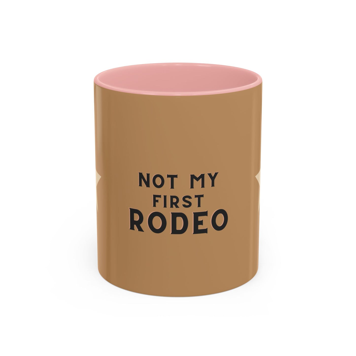 Brown mug with pink interior and 'Not My First Rodeo' text on a white background