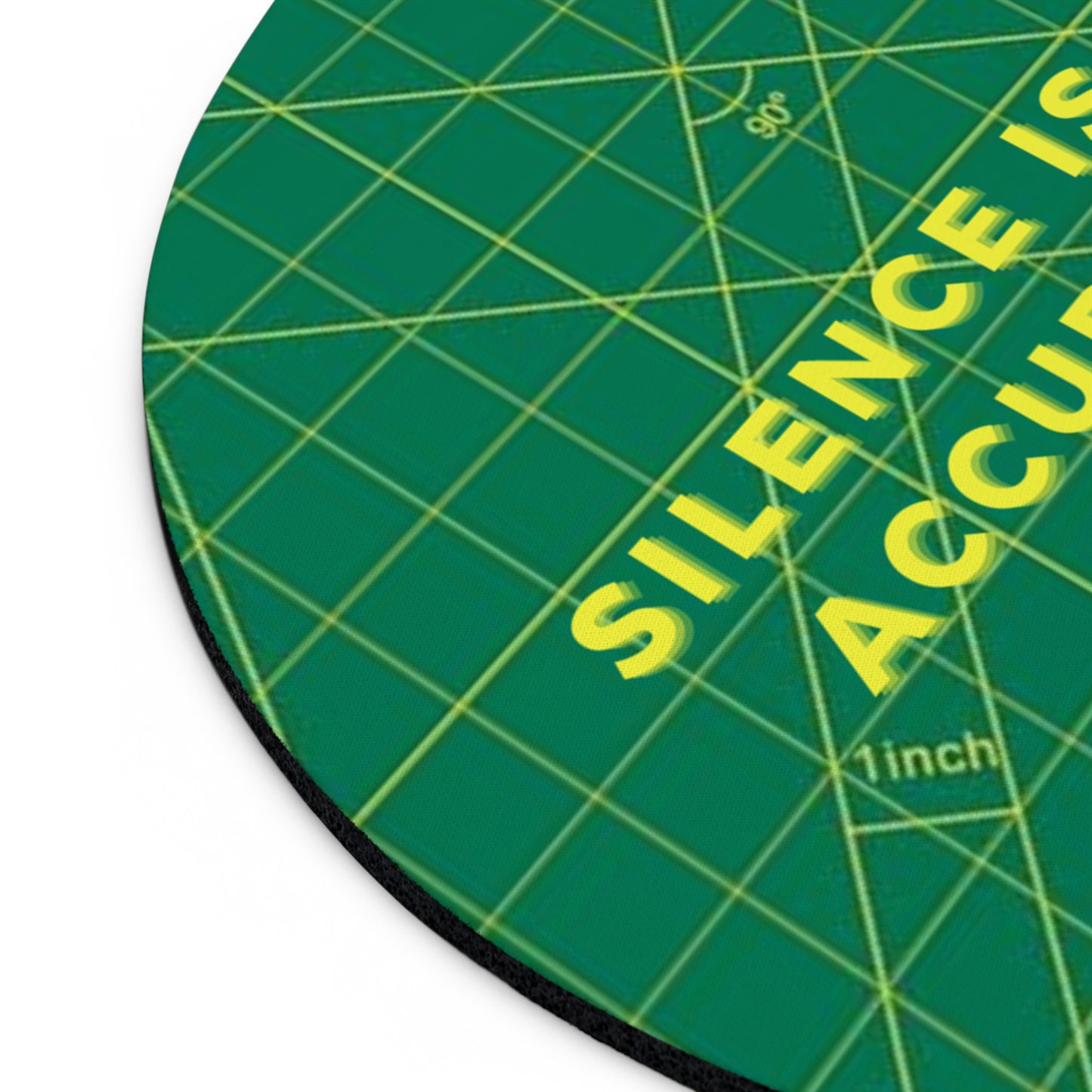 Green circular ruler with yellow text and grid lines