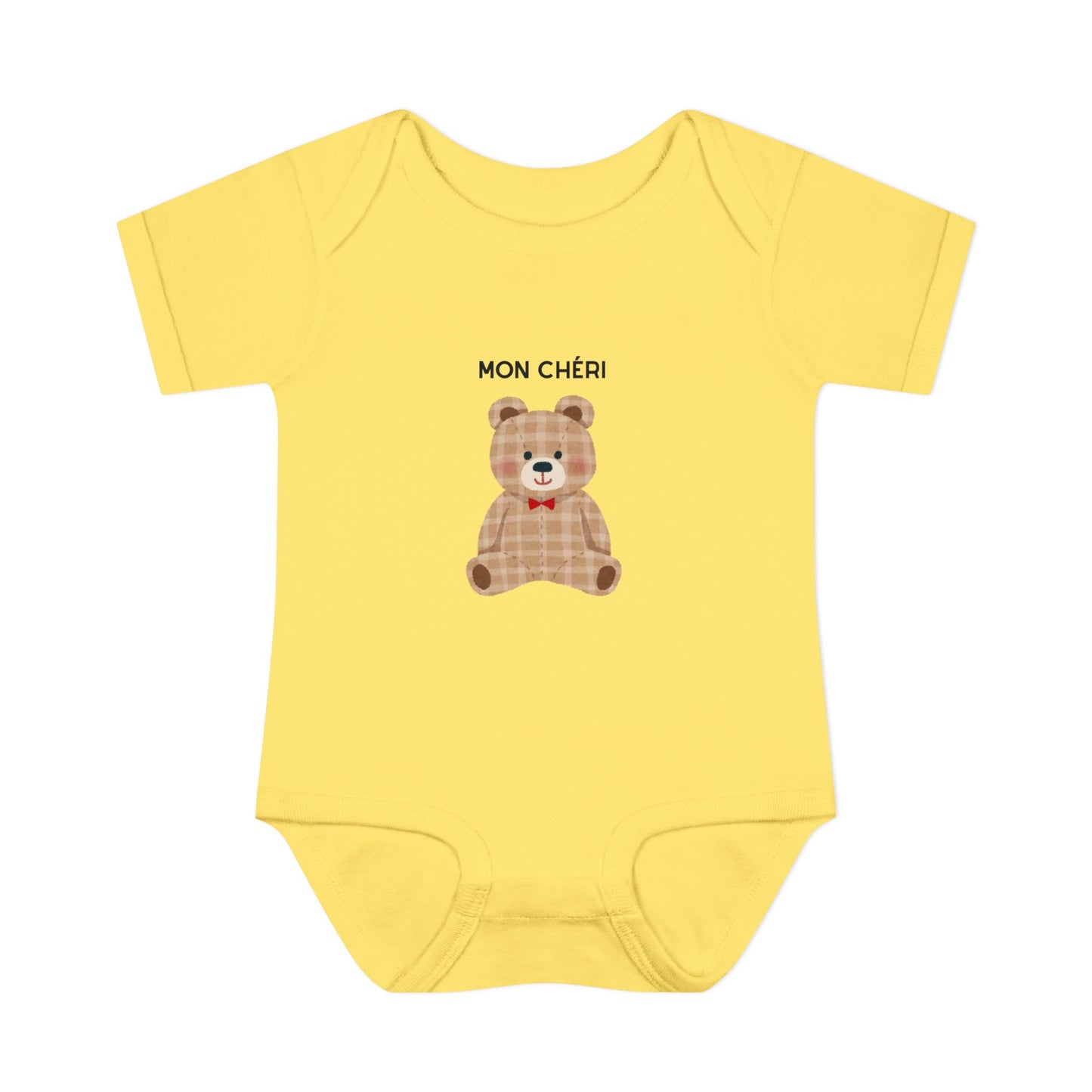 Yellow baby onesie with a teddy bear graphic and 'MON çéri' text on a white background