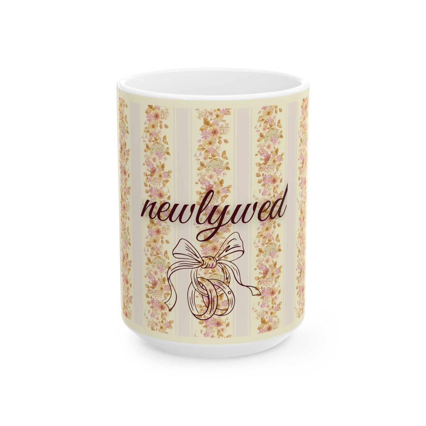 Mug with floral design and 'newlywed' text on a white background