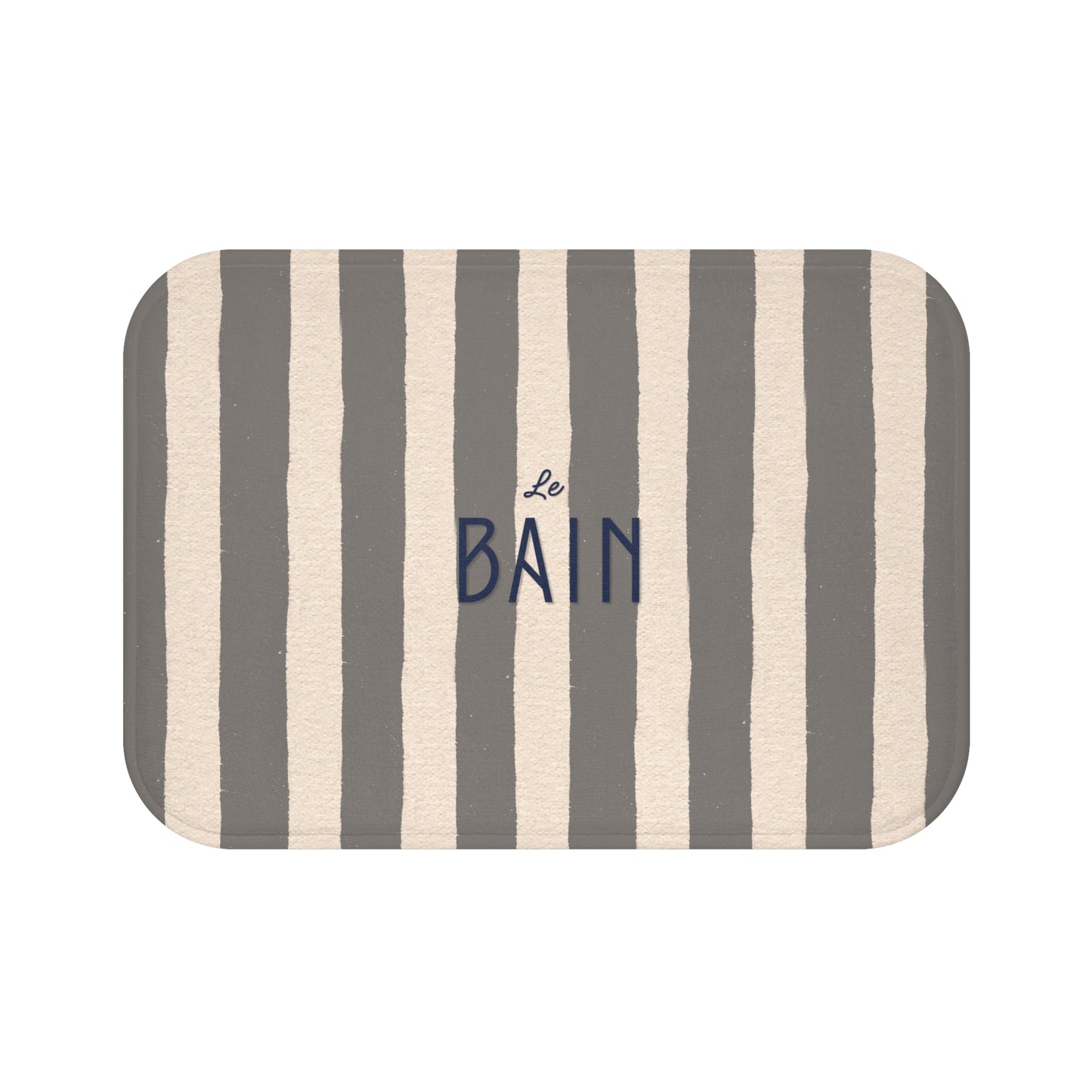 Striped bath mat with 'Le Bain' text on a white background