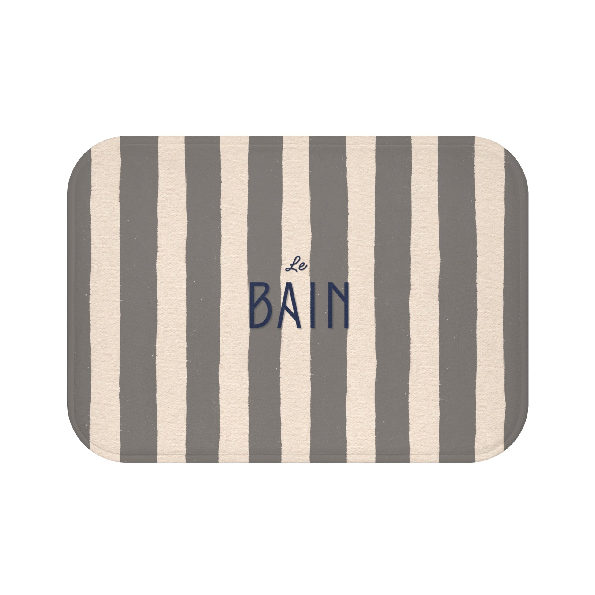 Striped bath mat with 'Le Bain' text on a white background