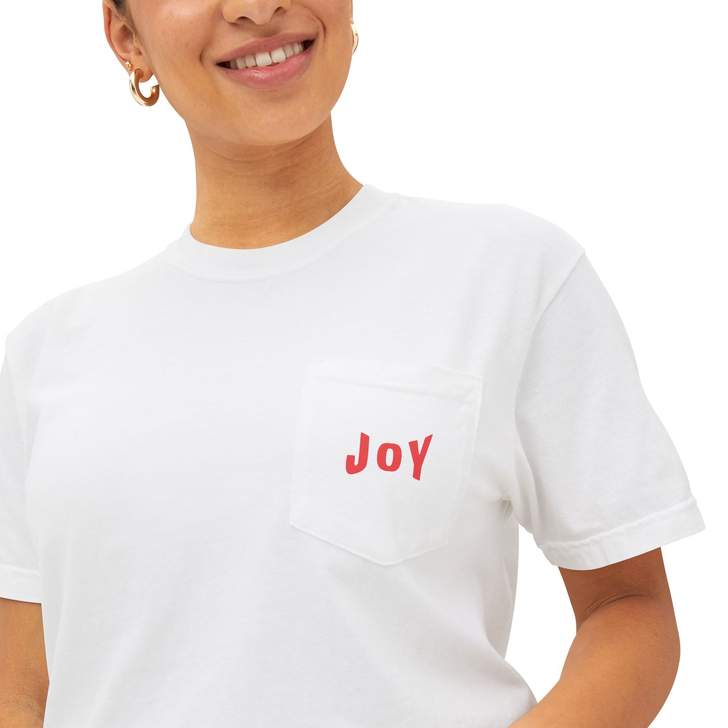 Person wearing a white t-shirt with 'JOY' printed in red on a white background