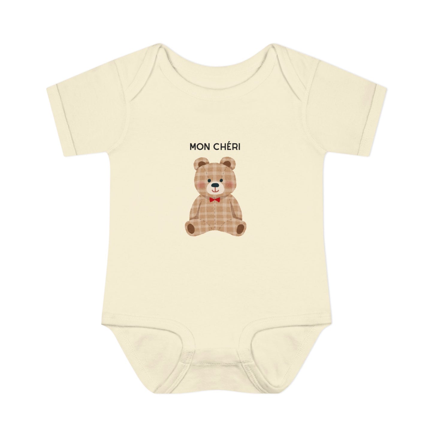 Beige baby onesie with a teddy bear design and 'MON çéri' text on a white background