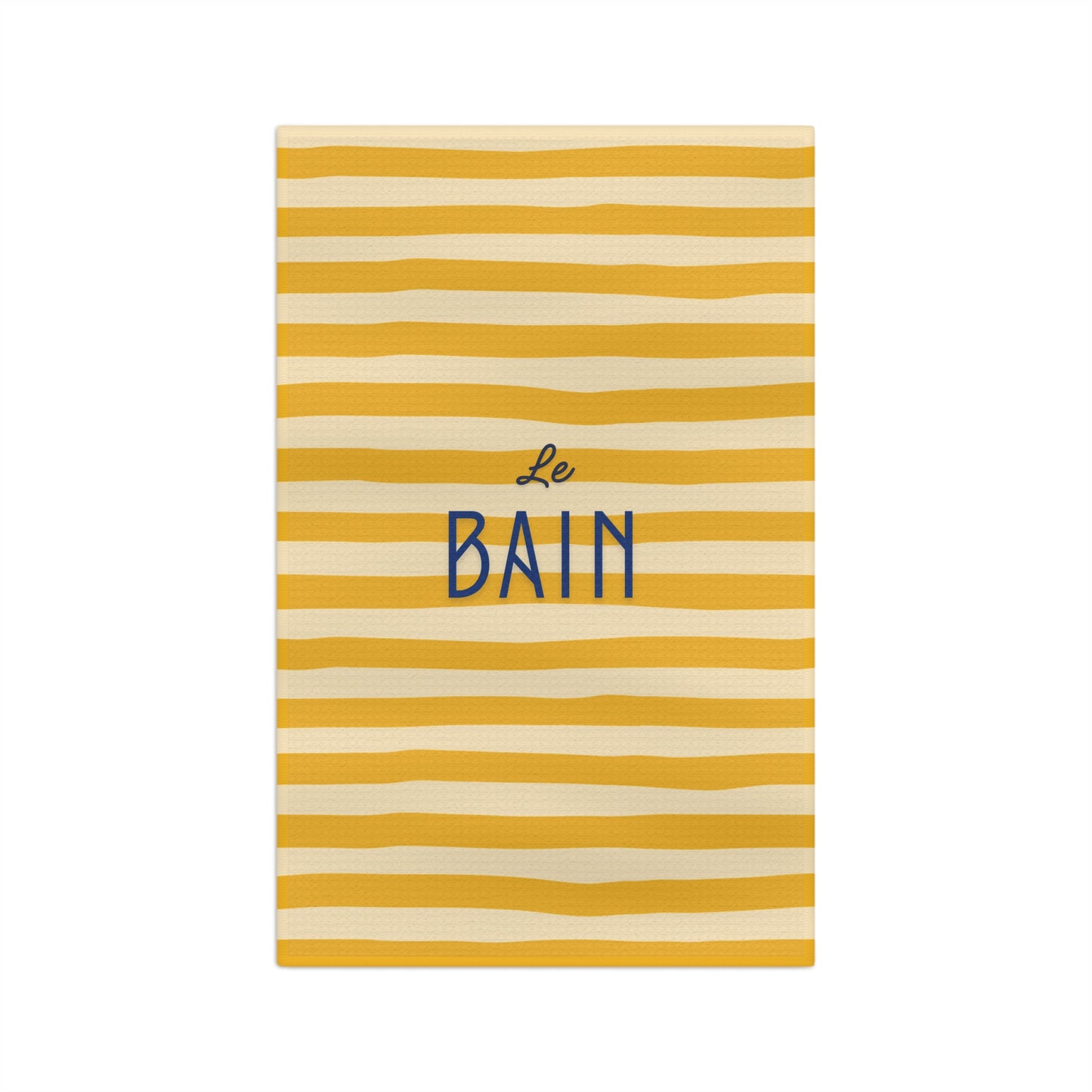 Yellow and white striped towel with 'Le Bain' text on a white background