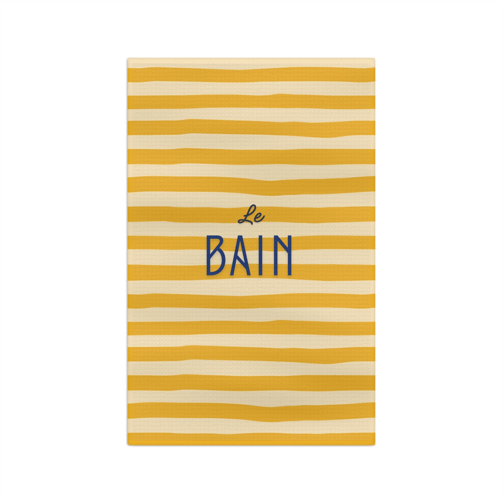 Yellow and white striped towel with 'Le Bain' text on a white background