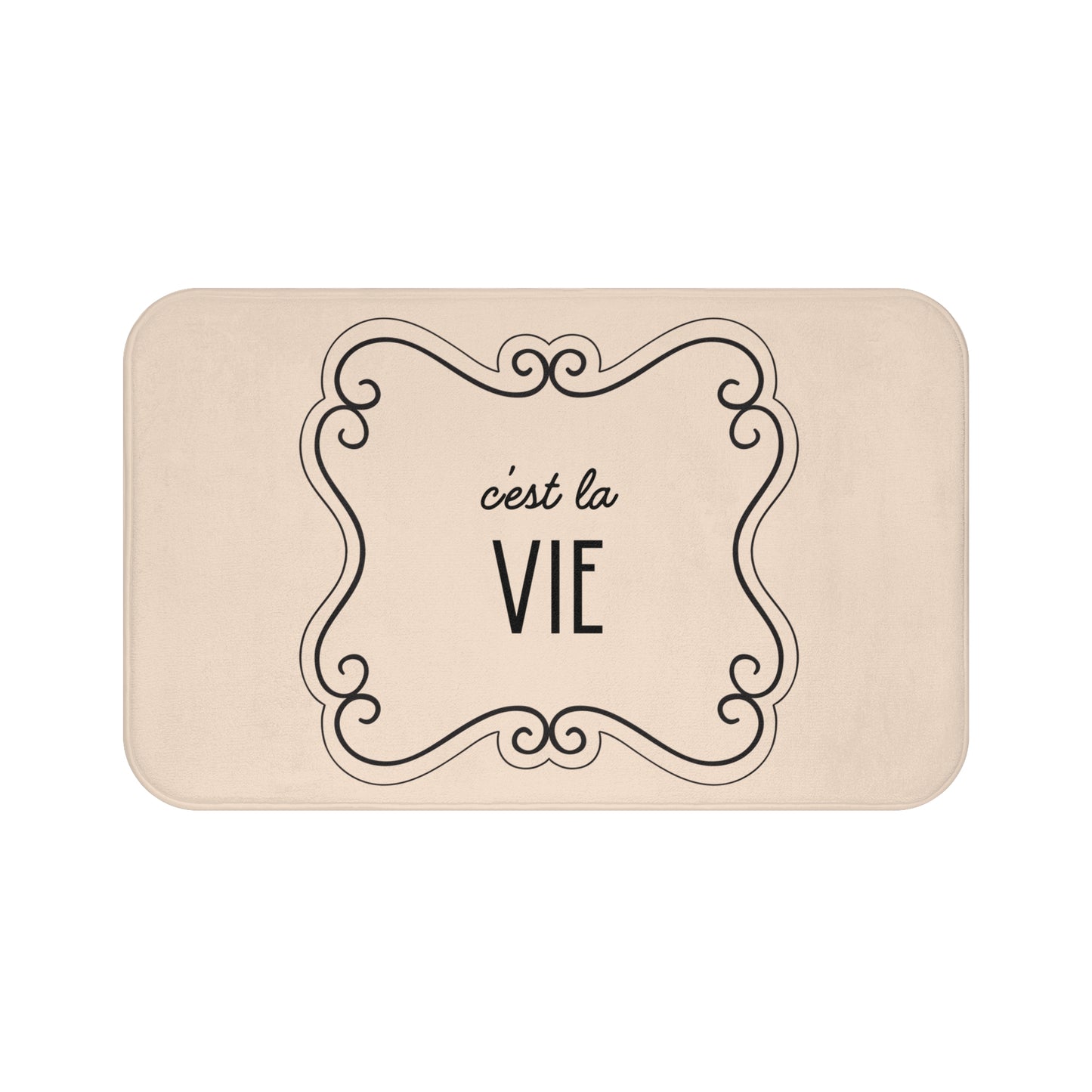 Beige mat with 'c'est la Vie' text and decorative frame on a white background