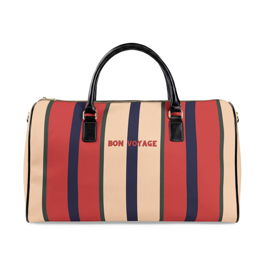 Striped duffel bag with 'Bon Voyage' text on a white background
