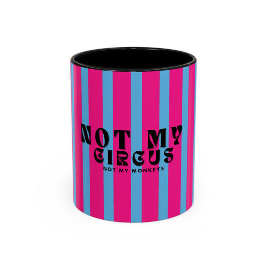 Striped mug with 'Not my circus, not my monkeys' text on a white background