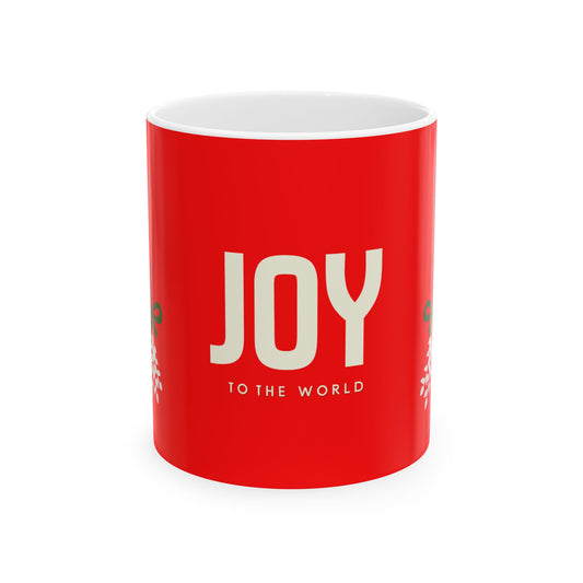 Red mug with 'JOY TO THE WORLD' text on a white background
