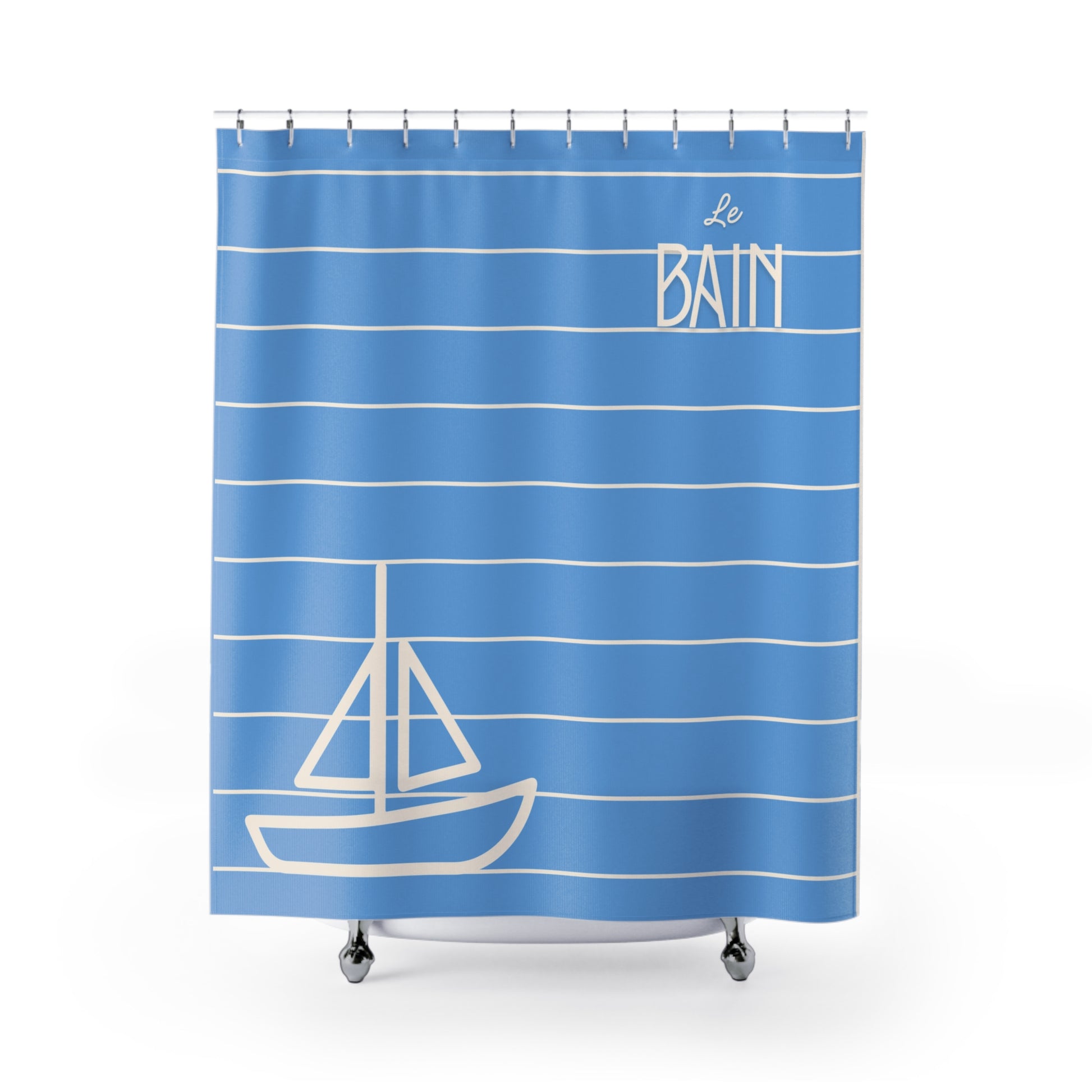 Blue shower curtain with white stripes and sailboat design on a white background