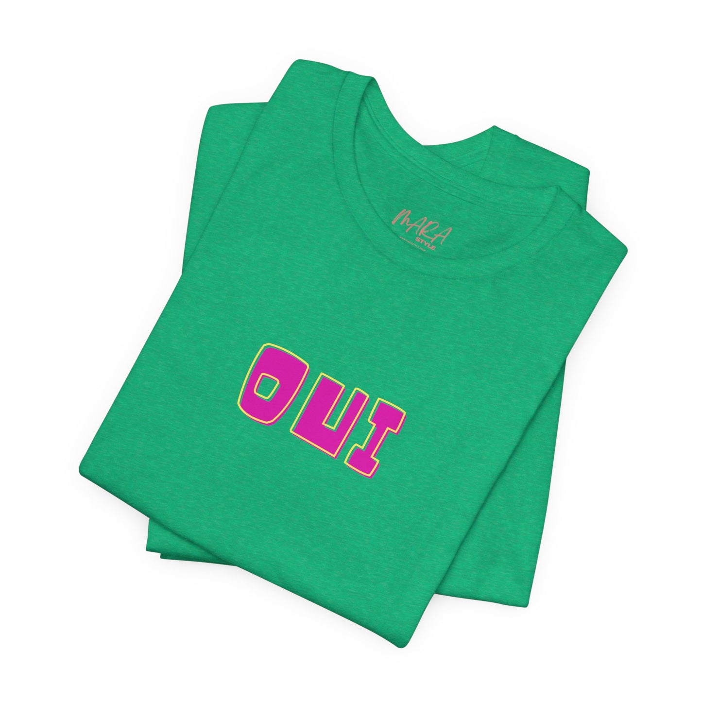 Green t-shirt with pink 'OUI' text on a white background