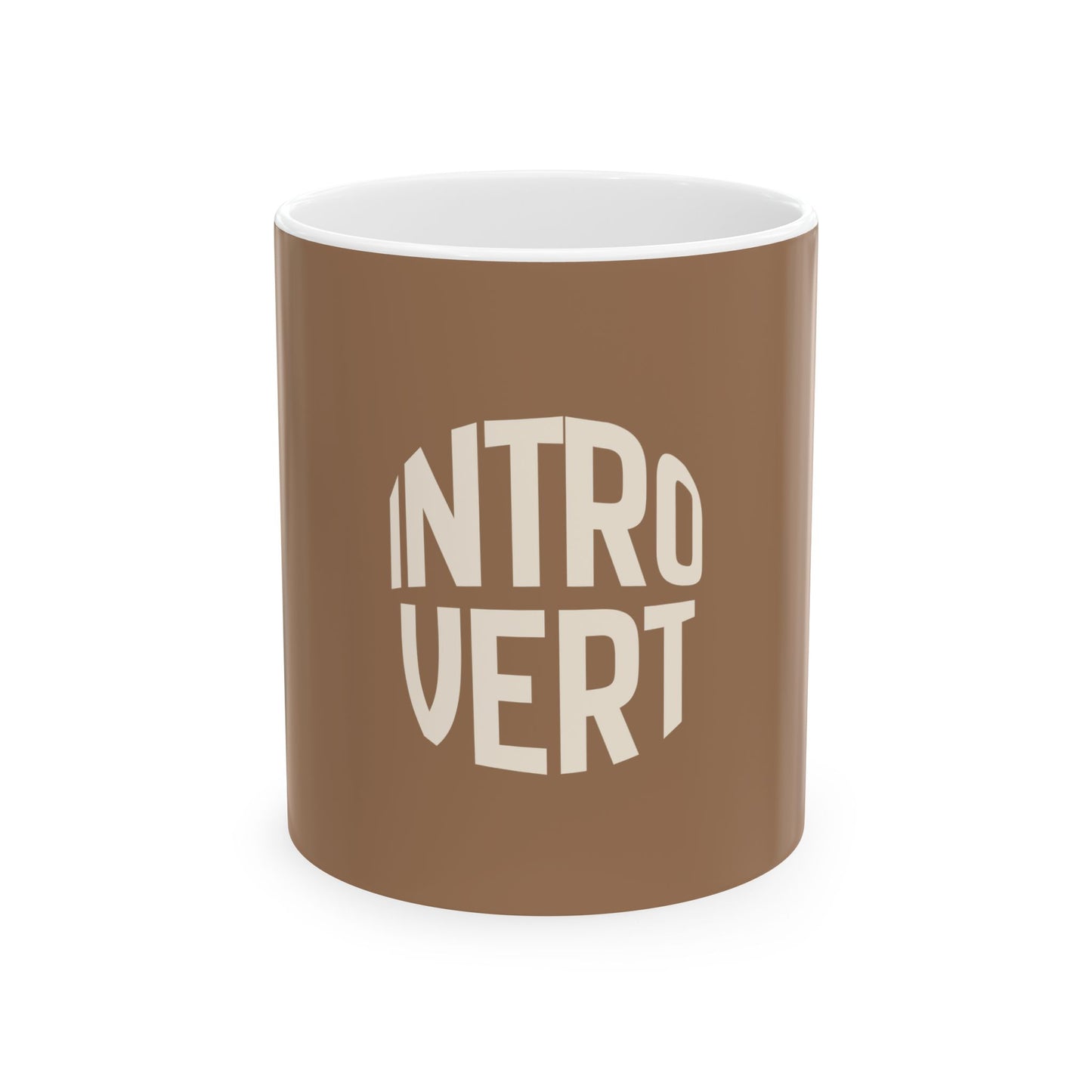 Brown mug with 'INTROVERT' text on a white background