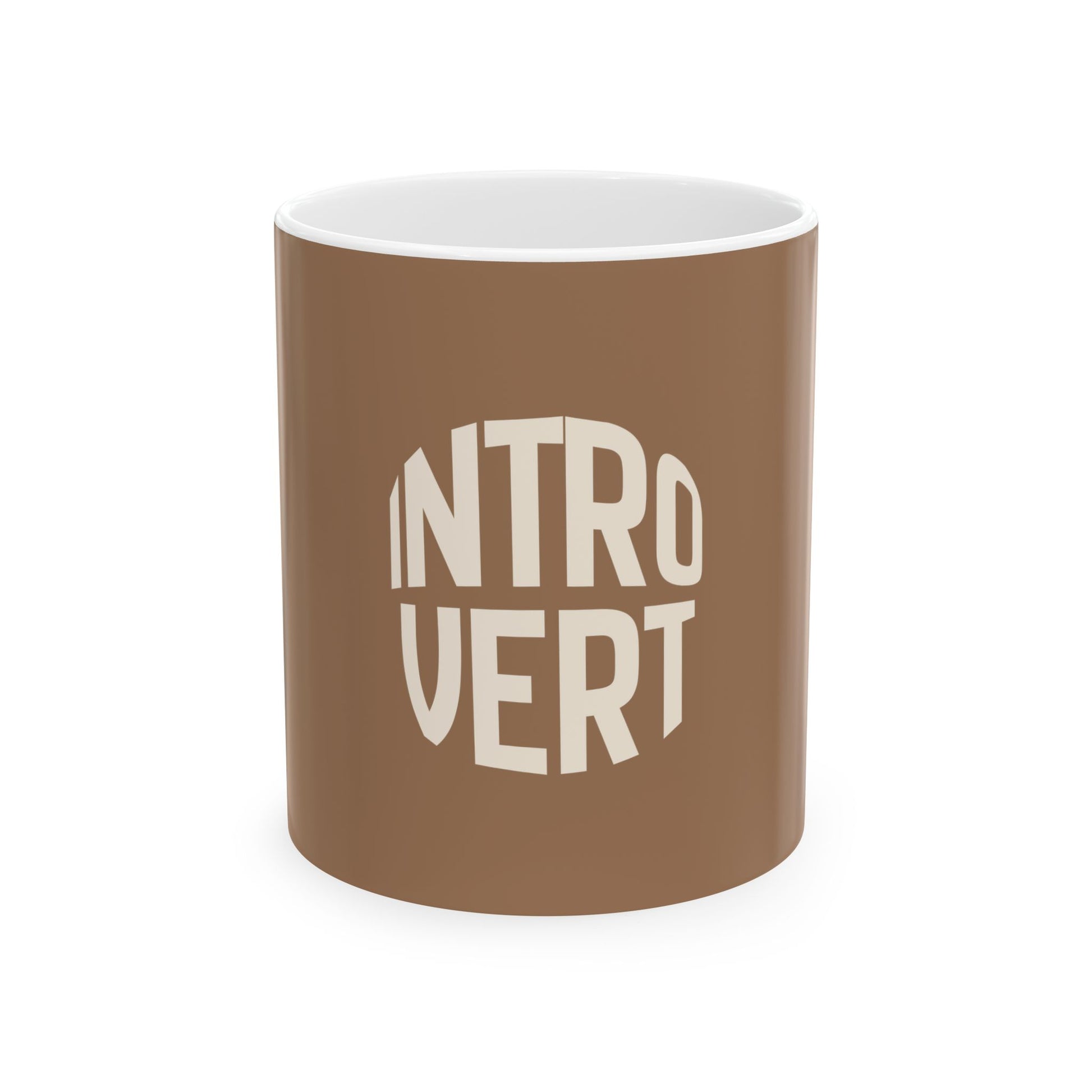 Brown mug with 'INTROVERT' text on a white background