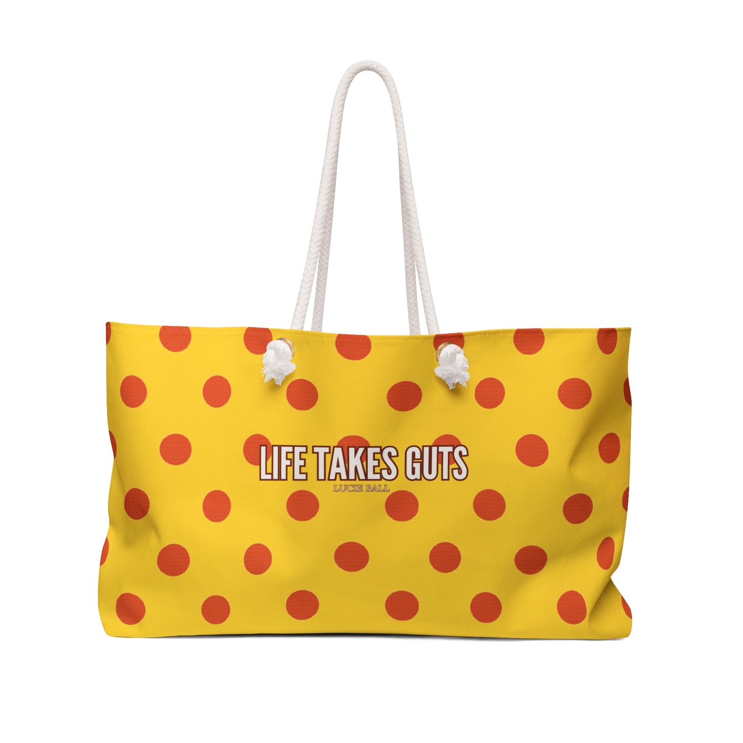 Yellow tote bag with red polka dots and 'Life Takes Guts' text on a white background