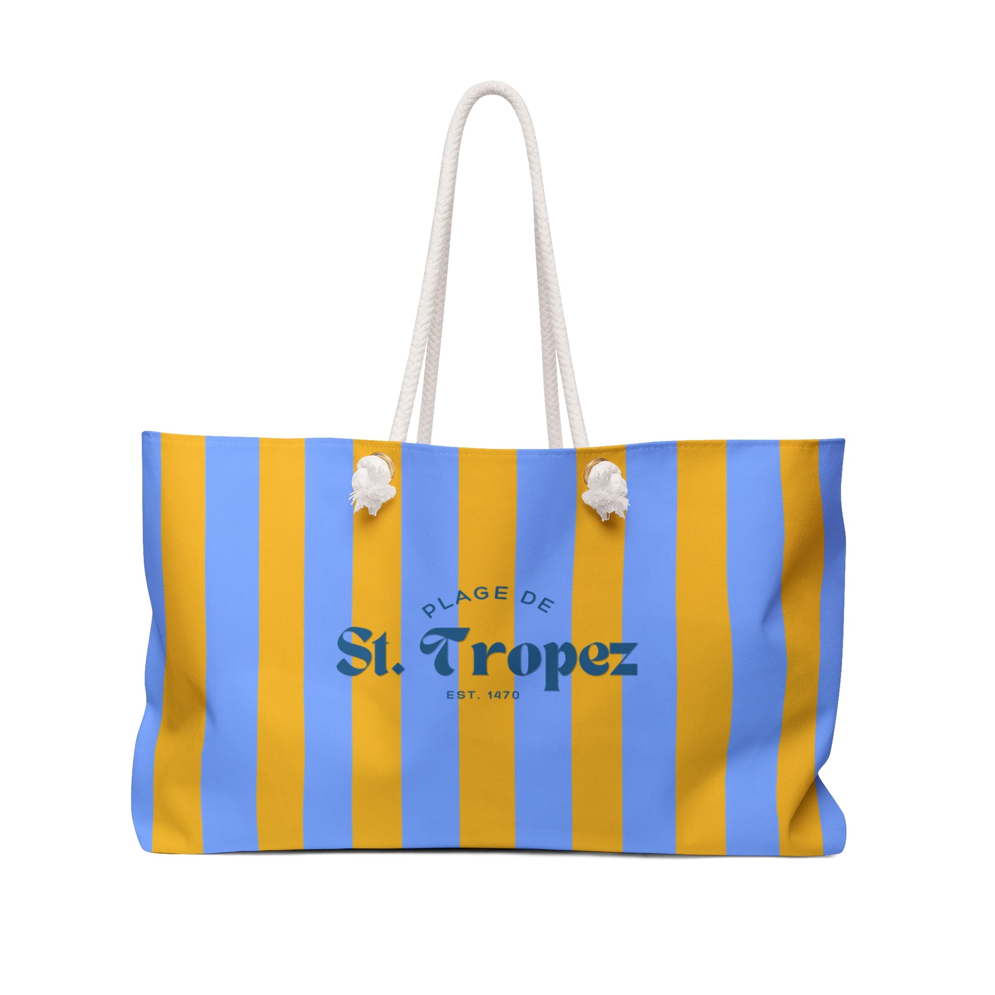 Striped bag with blue and yellow stripes and 'Plage de St. Tropez' text on a white background