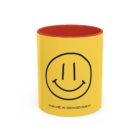 Yellow mug with smiley face and 'Have a good day!' text on a white background