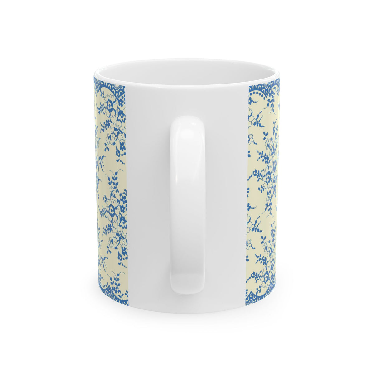 A white ceramic mug with a delicate blue floral pattern printed on both sides, shown against a plain white background.