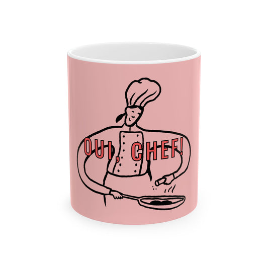 Pink mug with a chef illustration and 'Oui, Chef!' text on a white background
