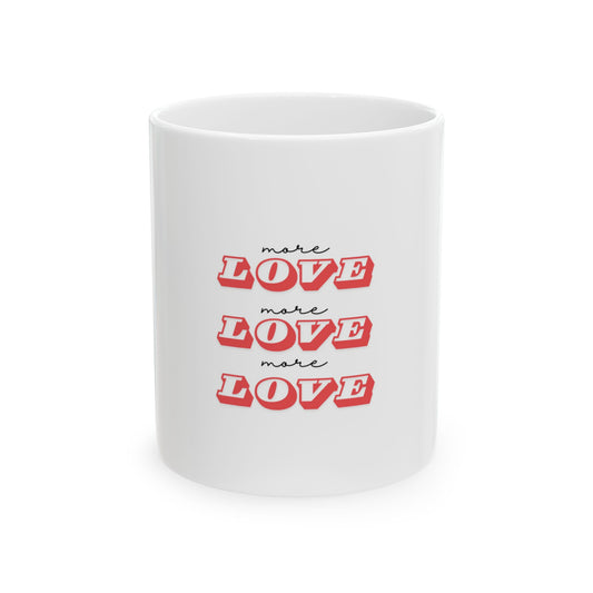 White mug with red text 'more LOVE' on a white background