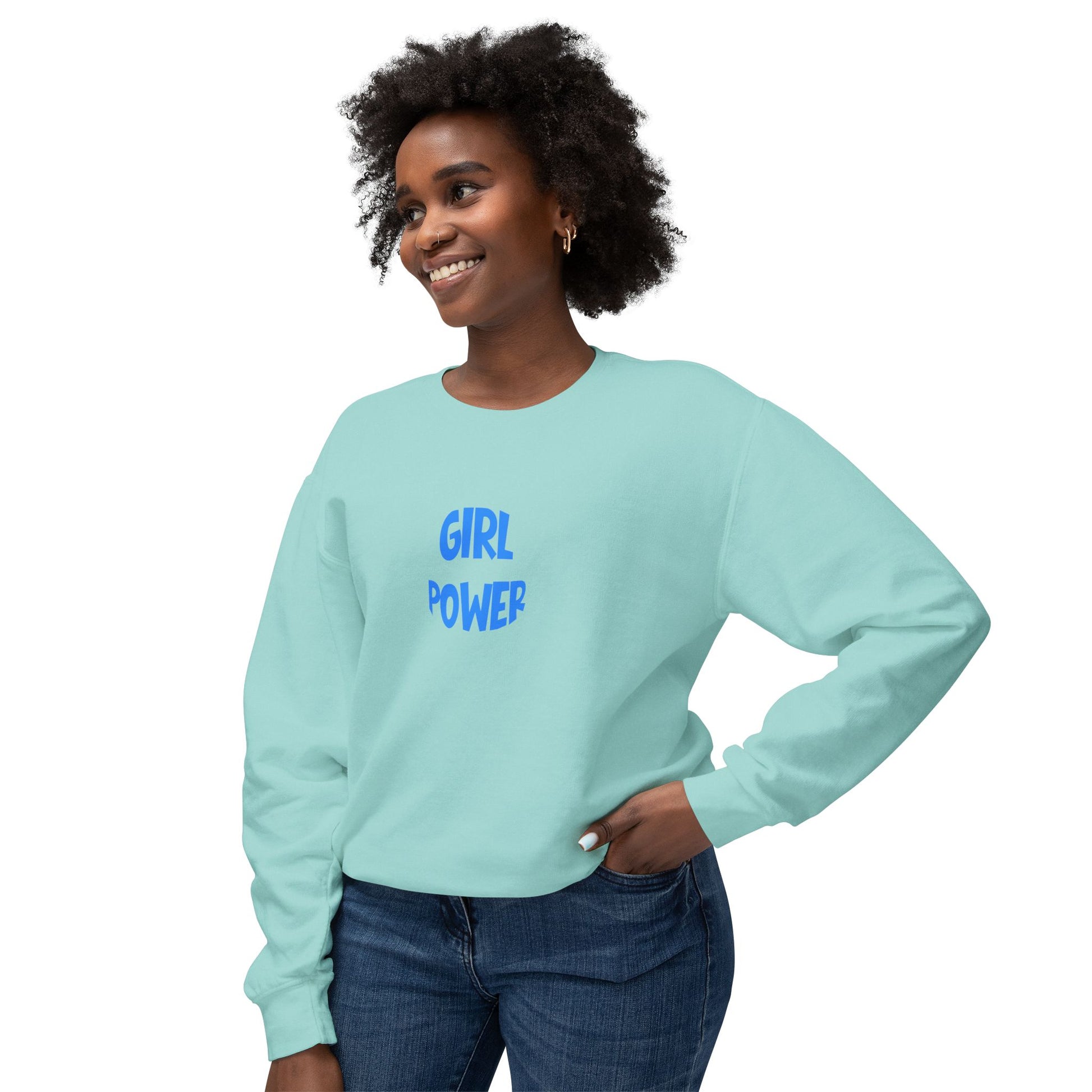Woman wearing a light blue sweatshirt with 'Girl Power' text on a white background