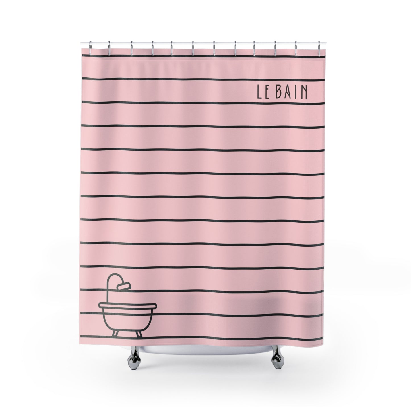 Pink shower curtain with thin black horizontal stripes, the word 'LE BAIN' printed near the top right, and a simple black line drawing of a bathtub at the bottom left. The curtain is shown hanging on a white rod against a clean white background.